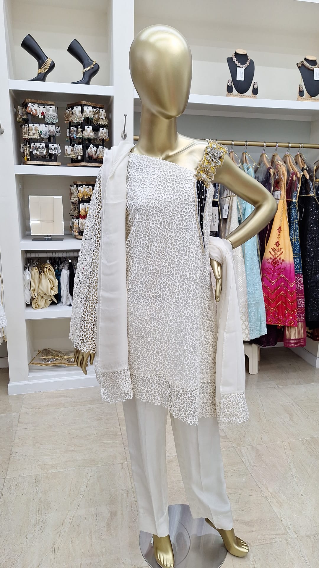 Ivory Impact: One-Shoulder Glamour