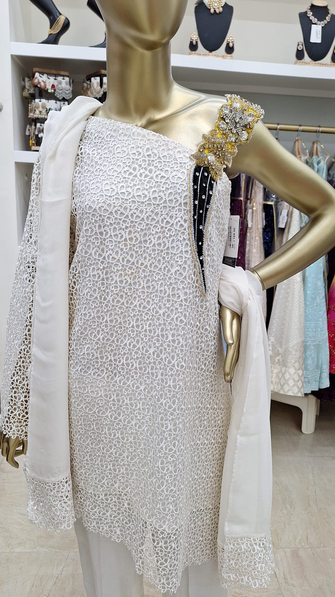 Ivory Impact: One-Shoulder Glamour