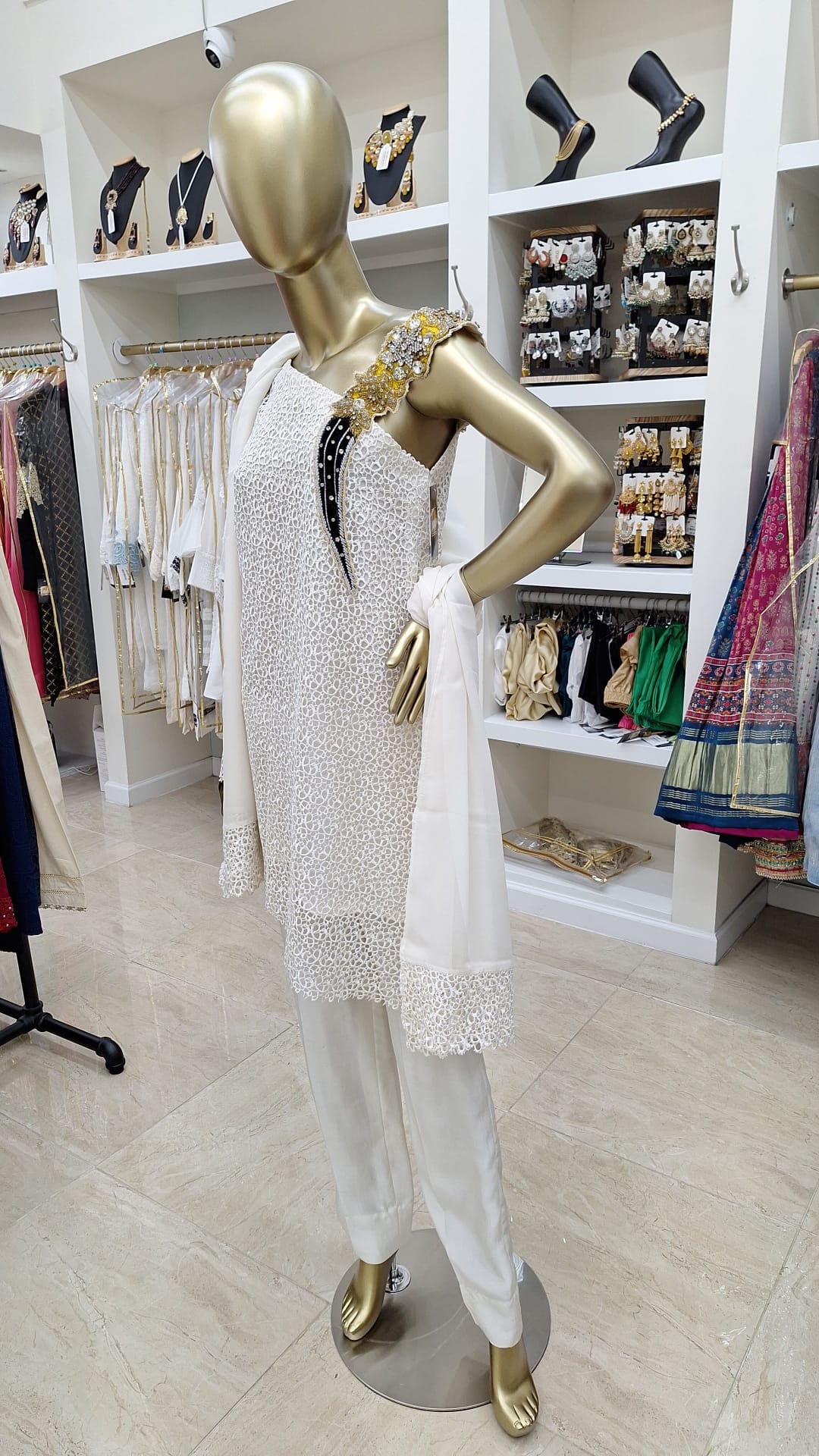 Ivory Impact: One-Shoulder Glamour